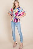 Printed Surplice Peplum Blouse