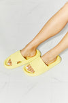 Arms Around Me Open Toe Slide in Yellow